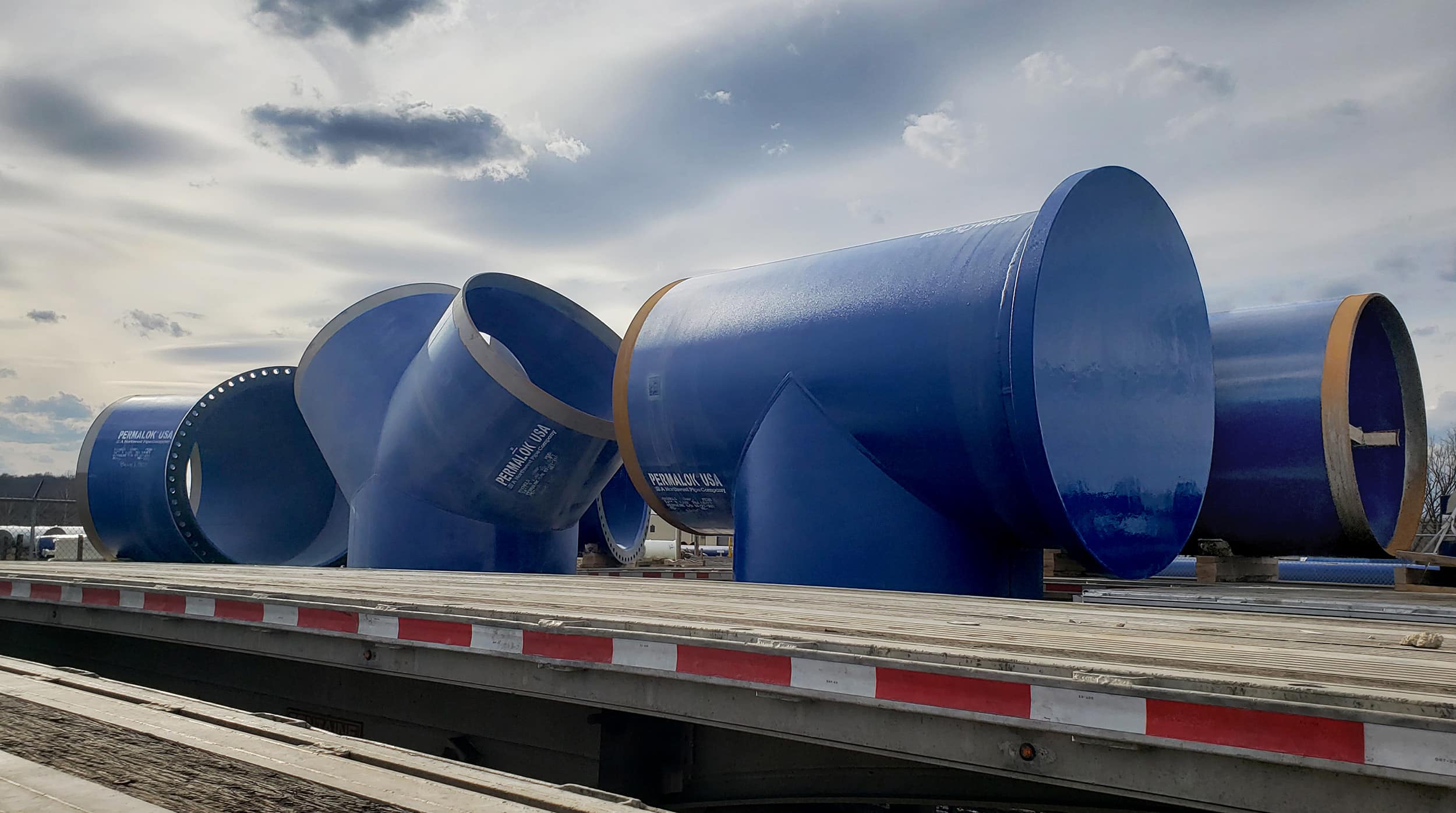 Custom 72-inch fittings with Permalok® T-7 joints for the project's intake pipe.
