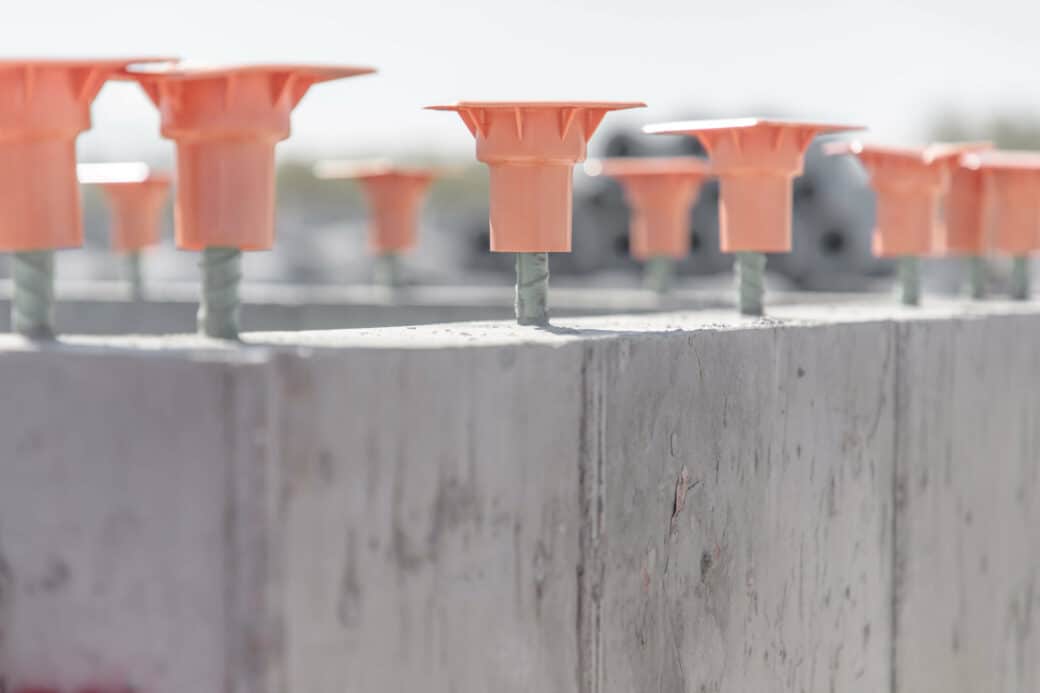 products rcp and precast other structures orange caps on metal rods