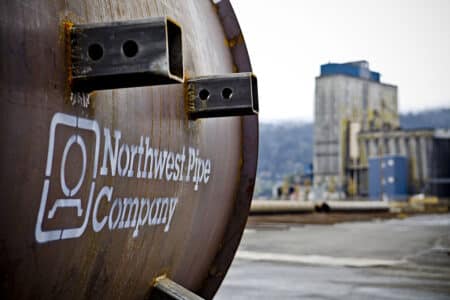 close up of northwest pipe company logo on steel pipe at portland production facility