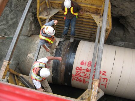 product esp joints three guys standing on pipe