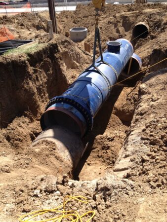 denver water blue pipe in dirt