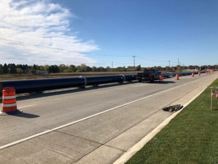 racine water transmission long pipe in road