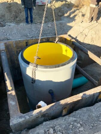 Perfect Lined Manhole being placed into place by crane