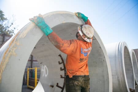 concrete jacking pipe being prepared for installation