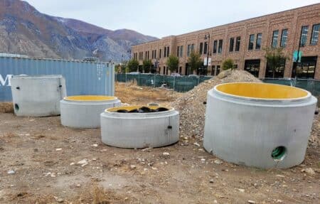 Perfect Lined Manhole components on jobsite awaiting installation