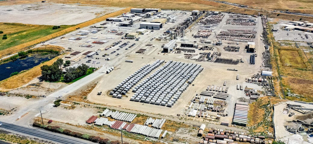 Aerial Shot of Concrete Pipe and Steel Pipe in Yard